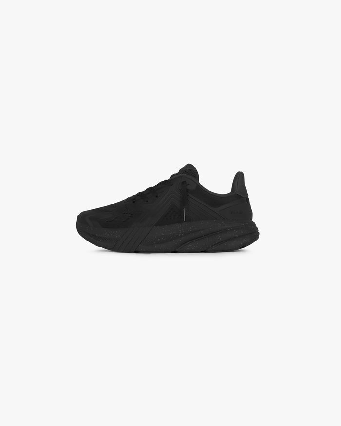 Close up of mens black running shoe on a plain white background | 247 Arc-1 Runner in Black | Lightweight engineered mesh upper | 247 Footwear | Represent Clo