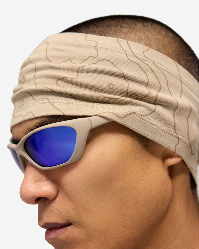 Product image of mens beige sunglasses on a plain white background | 247 Arena Sunglasses in Pebble | Sunglasses with polarised lenses and rubberised grip | 247 Accessories | Represent Clo
