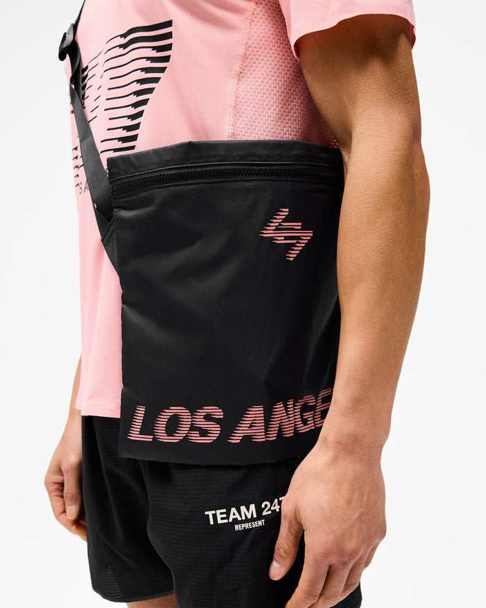 Product image of a mens black bag on a plain white background | 247 Los Angeles Bag in Black | Lightweight bag with ripstop fabric and zippered main compartment | 247 Accessories | Represent Clo