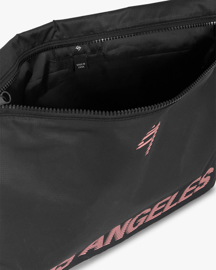 Product image of a mens black bag on a plain white background | 247 Los Angeles Bag in Black | Lightweight ripstop fabric bag with zippered compartment | 247 Accessories | Represent Clo