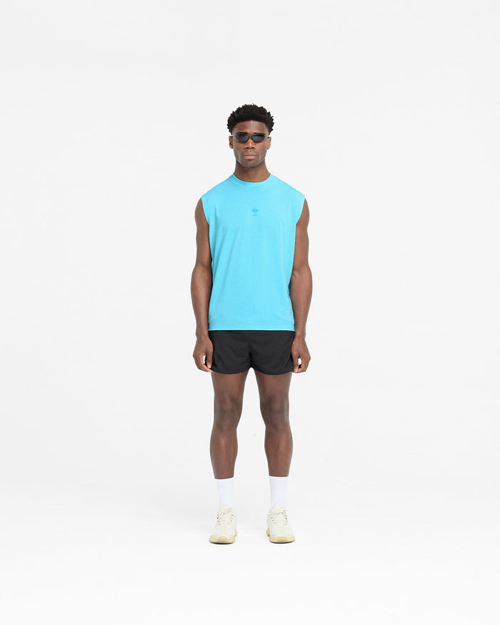 Man wearing an oversized blue tank top on a plain white background | 247 Oversized Tank in Ultra Blue | Lightweight tank with 4-way stretch | 247 T-Shirts | Represent Clo