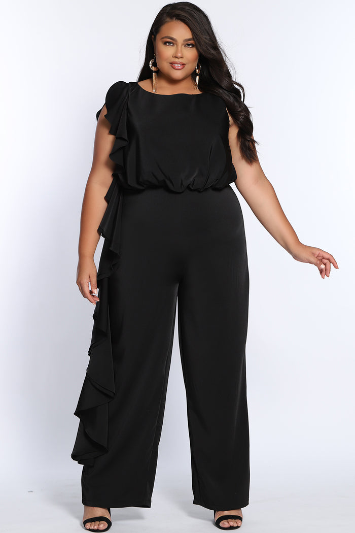 CE2014 by Sydney's Closet french crepe fabric jumpsuit with flounce on side of bodice and pant with center back zipper and scoop neckline, bra friendly straps and sleeveless available in red, black and ivory.