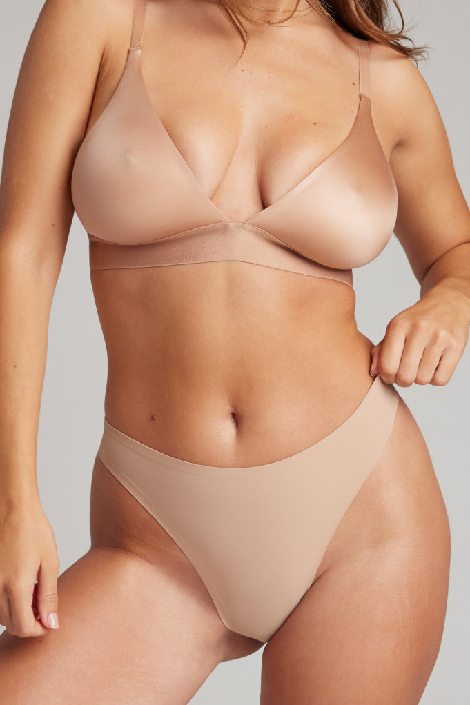 Buff high-rise thong underwear, front view with V-shaped center seam and high legs