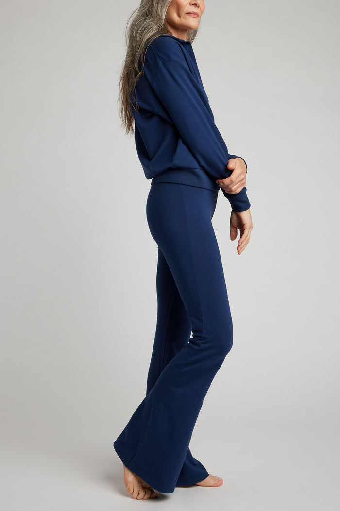 Navy flare pants in straight profile with side seam and wide leg opening