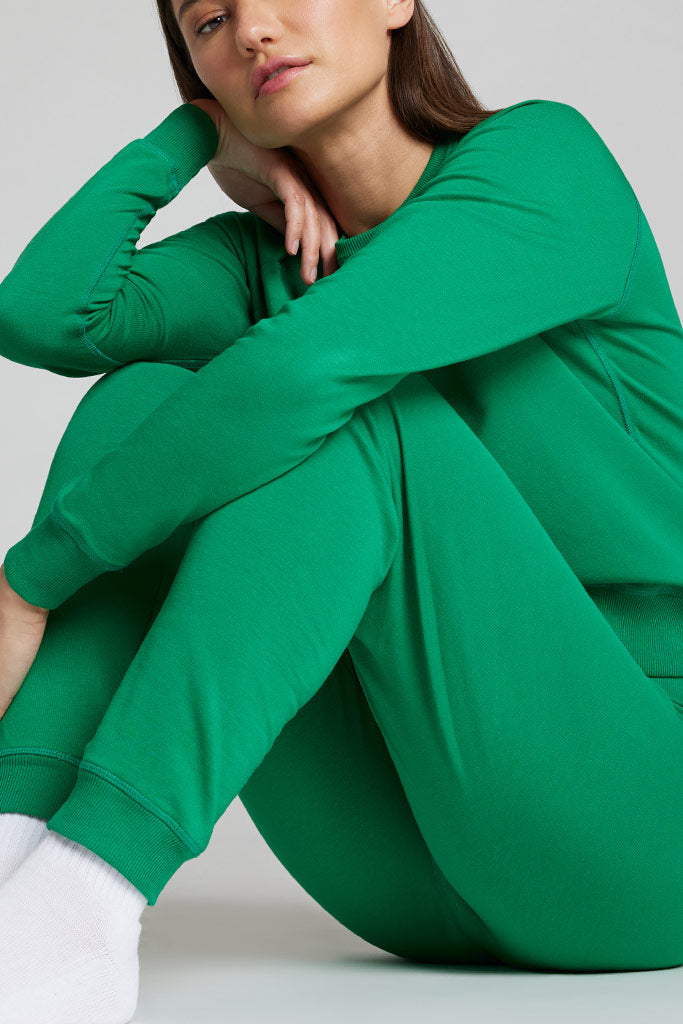 Green jogger pants with drawstring waist and relaxed tapered fit