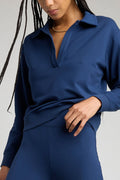 Navy long-sleeve collared club pullover with button placket, relaxed fit