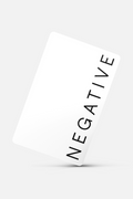White digital gift card with 'NEGATIVE' text printed diagonally