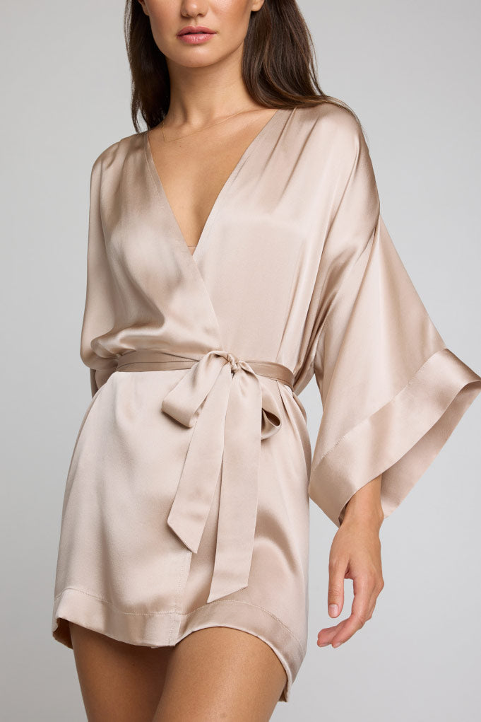 Light champagne satin mini robe with V-neck, wide sleeves, and bow-tie belt