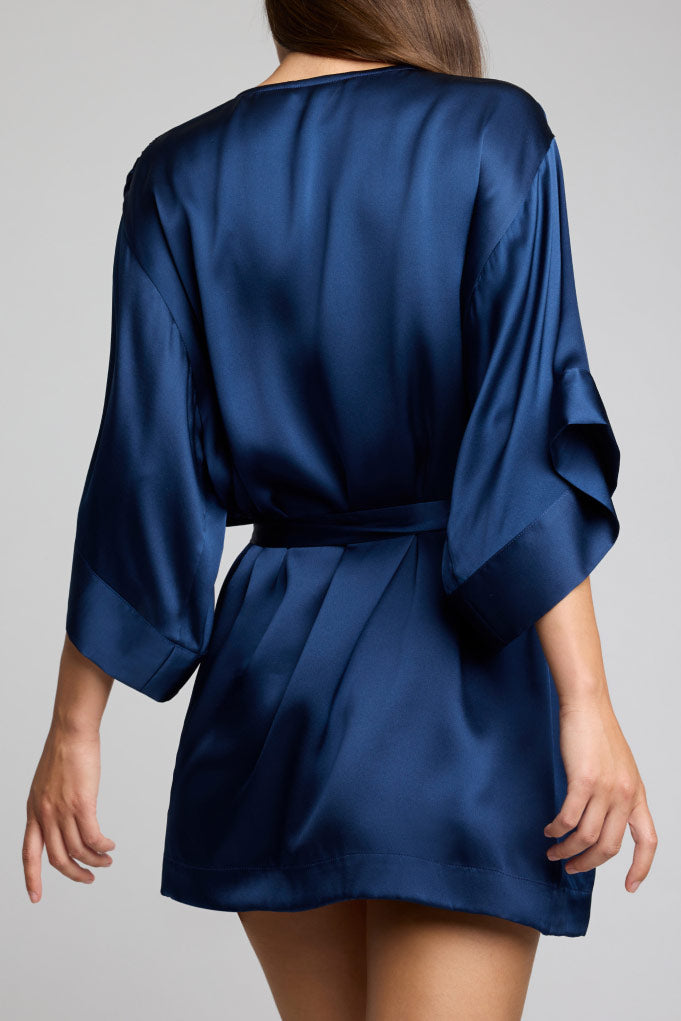 Navy washable silk mini robe with V-neck, self-tie belt, and draped kimono sleeves