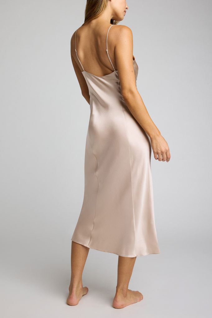 Washable silk slip back view, pale pink satin midi length with open back straps