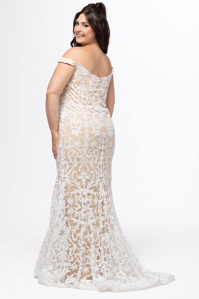 Plus-size woman wearing an off-the-shoulder nude and ivory sequin embroidered formal gown with sweetheart neckline, off-the-shoulder straps and fitted silhouette. CE2611 available from Sydney's Closet