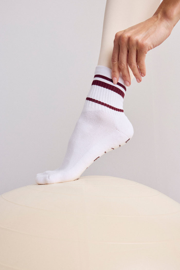 White ankle socks with burgundy and gray striped ribbed cuff
