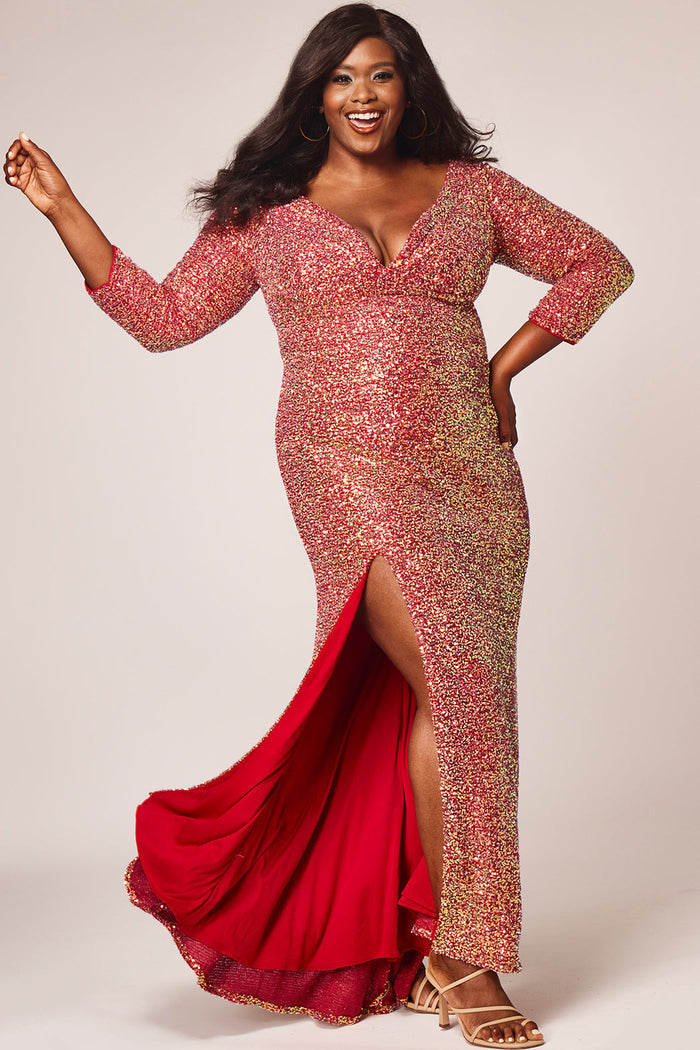 SC7333 Sydney's Prom by Sydney's Closet slim silhouette with deep v neckline and long sleeves with pleated bodice and empire waistline and leg slit that starts 15 inches from waist availablie in green surge, blue blitz or firecracker red