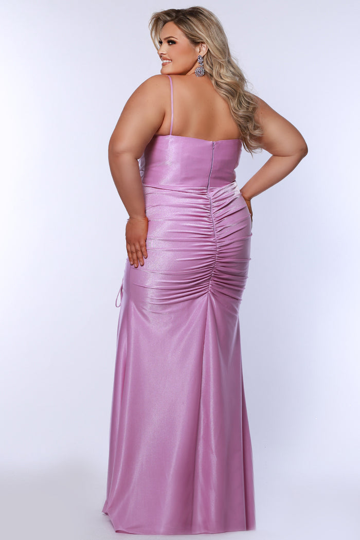 Slim fitted stretch satin plus size formal prom dress.  Pleated bodice, ruched skirt with gathered ties on slit, spaghetti straps and ruched back skirt with train.  Availablie in light blue, orange and lilac in sizes 14-24. Style SC7422 by Sydney's Closet.