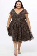 Celebrations by Sydney's Closet style CE2605 in animal print. 

Knee length plus size animal print dress.  V-neck, short flutter sleeves, natural waistline, pockets and ruffles on bodice princess seams. Made from printed chiffon and light satin lining. Center back zipper.