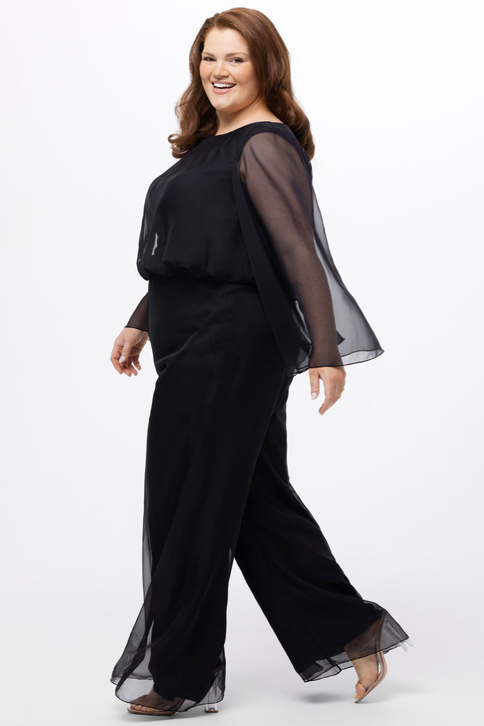 Celebration's by Sydney's Closet style CE2608 in black. 

Scoop neckline, long cape sleeve chiffon jumpsuit. Wide leg pants, blouson bodice and natural waistline. High scoop back with center back zipper.