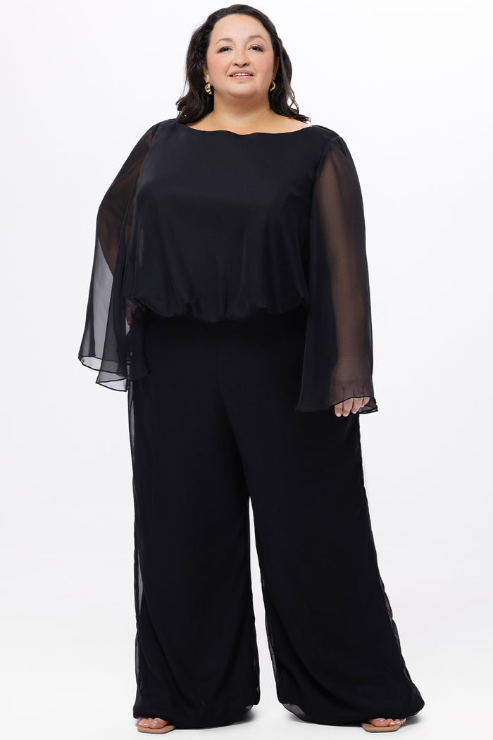 Celebration's by Sydney's Closet style CE2608 in black. 

Scoop neckline, long cape sleeve chiffon jumpsuit. Wide leg pants, blouson bodice and natural waistline. High scoop back with center back zipper.