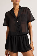 Black short-sleeve button-up shirt with collar, cropped silhouette