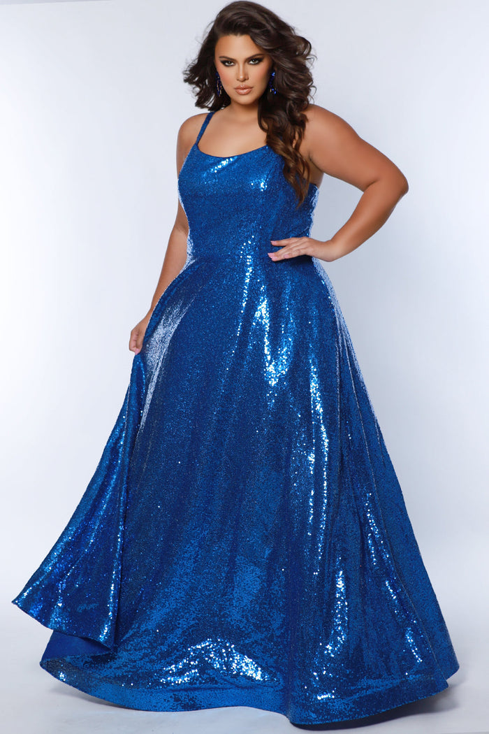 Sydney's Closet SC7387 Royal. All over dense sequin, scoop neckline, sequin covered straps, floor length A-line skirt, horse hair hem, center back zipper.