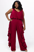 Celebrations by Sydney's Closet Style CE2615 in cherry red.

One-piece crepe satin jumpsuit with ruffled on outer pants seams. Bra-friendly straps, blouson bodice and wide leg pants. Center back zipper and scoop neckline.