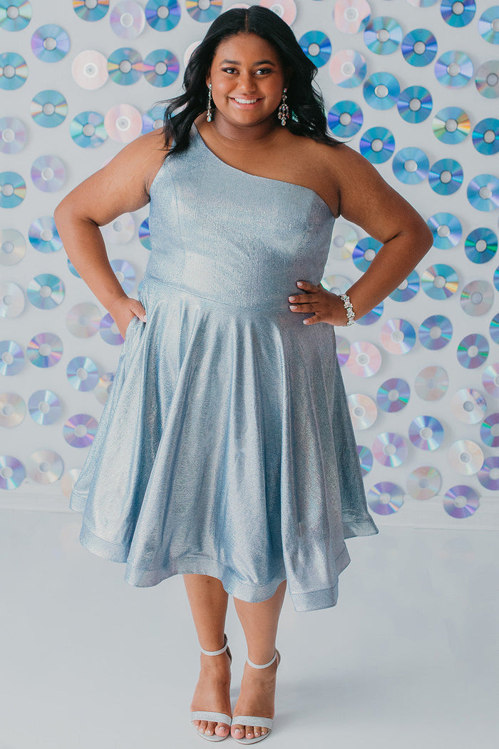 SC8119 plus size metallic one-shoulder short homecoming dress with A-line skirt and pockets.