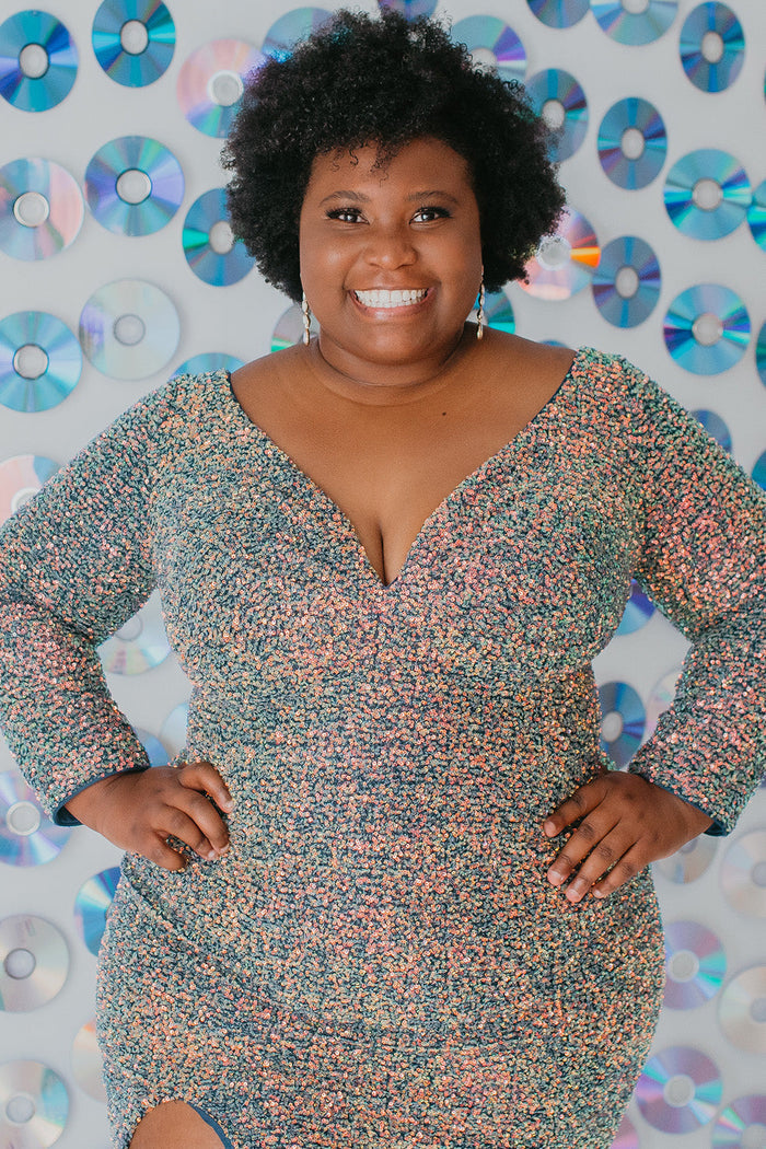 Sydney's CLoset SC8111 short plus size part y  dress with deep V-neckline, long sleeves and high slit. Multi dimensional sequins and ruched bodice.