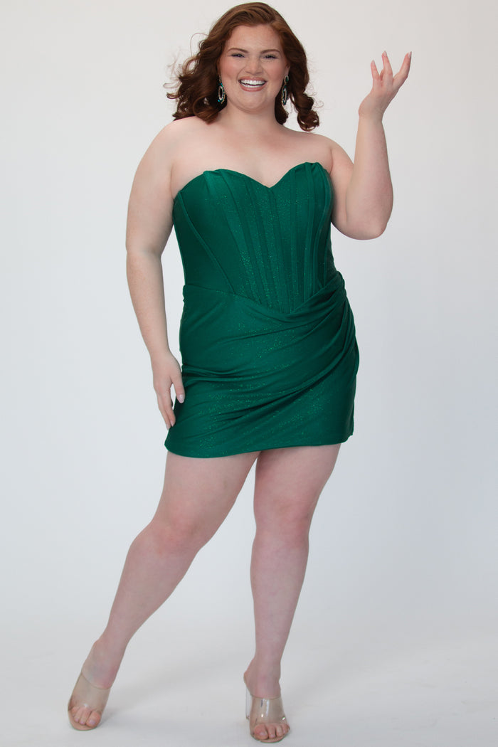 Short fitted green party dress SC8143 by Sydney's Closet. Front view.  Strapless, exposed boning basque waist and ruched fitted skirt in shimmer stretch knit. Availability in black, purple, red, ivory, green and royal. Model in picture is 5'9.