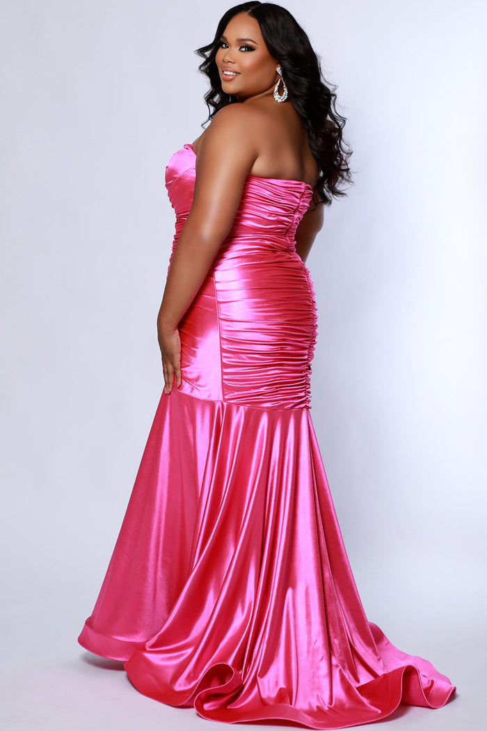 Sydney's Closet SC7364 Pink. Stretch Satin, Stretch knit lining, Fitted silhouette, Strapless Sweetheart bodice, optional spaghetti straps, Ruched front and back bodice, Invisible center back zipper, Sweep train, Horsehair hem