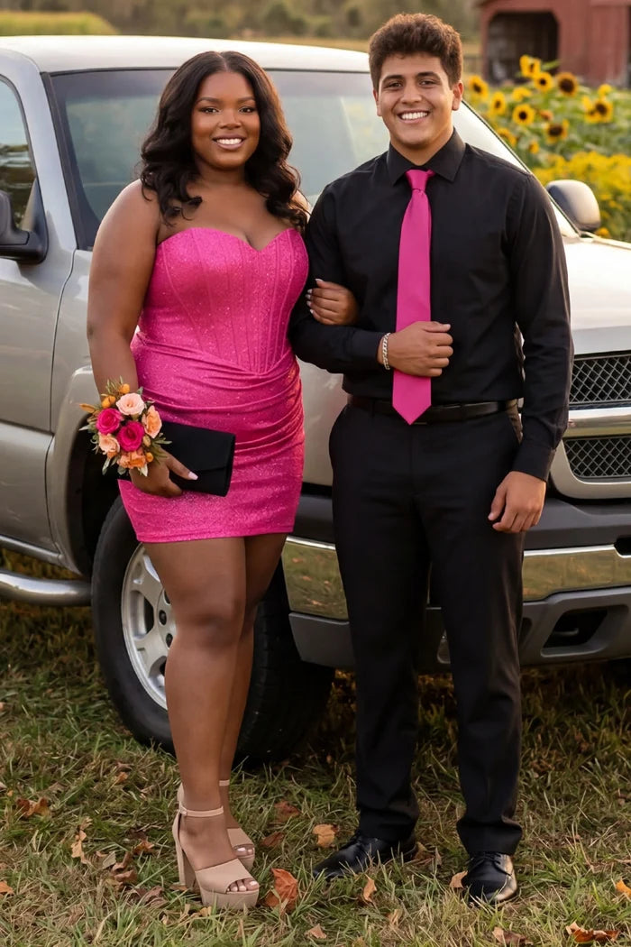 Two teenagers people in semi-formal attire standing in front of a vehicle with sunflowers in the background.

Short fitted magenta pink party dress SC8143 by Sydney's Closet. Strapless, exposed boning basque waist and ruched fitted skirt in shimmer stretch knit. Long invisible center back zipper. Availability in black, purple, red, ivory, green, turq and royal. Model in picture is 5'9.