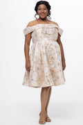 Celebrations by Sydney's Closet CE2610 in Gold Floral. 

Plus size knee-length party dress in metallic gold floral brocde print. Off-the-shoulder neckline, natural waistline and A-line skirt with pockets.