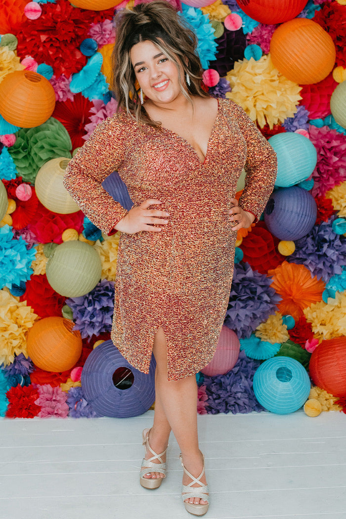 Sydney's CLoset SC8111 short plus size part y  dress with deep V-neckline, long sleeves and high slit. Multi dimensional sequins and ruched bodice.