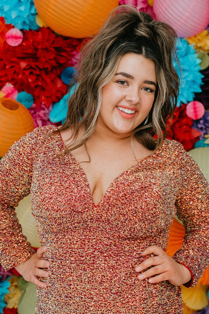 Sydney's CLoset SC8111 short plus size part y  dress with deep V-neckline, long sleeves and high slit. Multi dimensional sequins and ruched bodice.