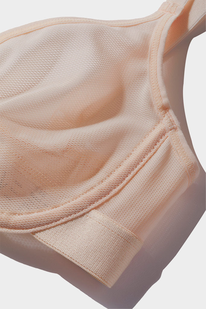 Peach sheer demi bra with textured mesh cups and scalloped trim