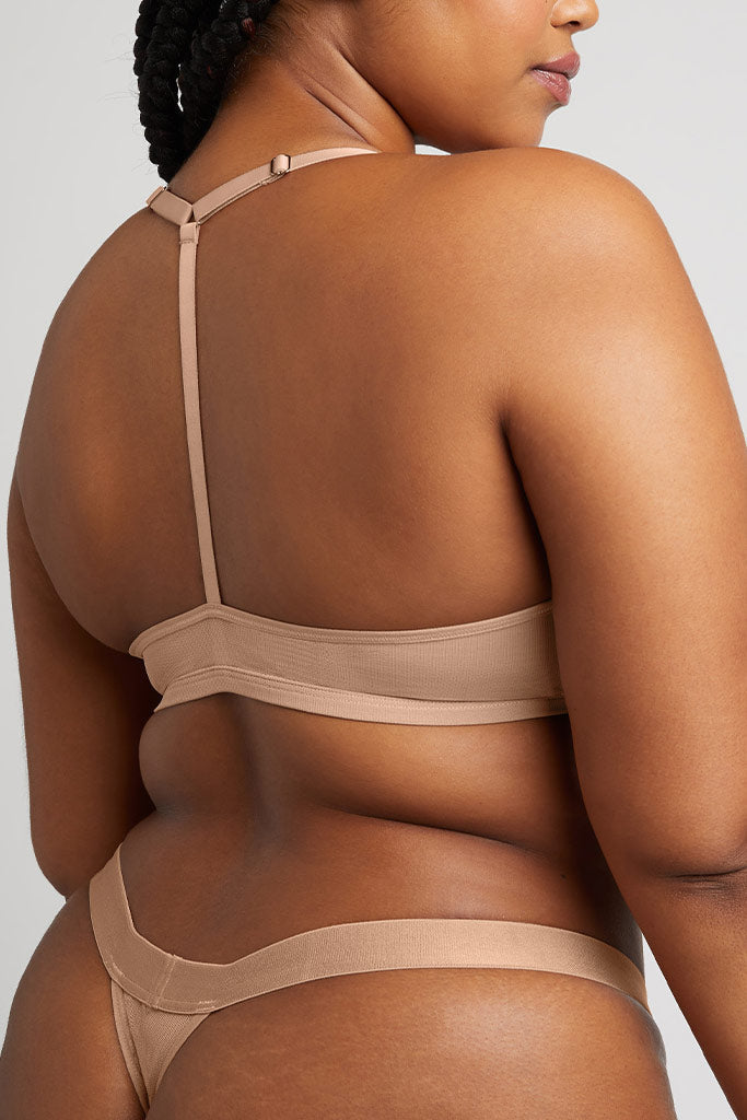 Buff racerback bra back view with adjustable straps and hook closure