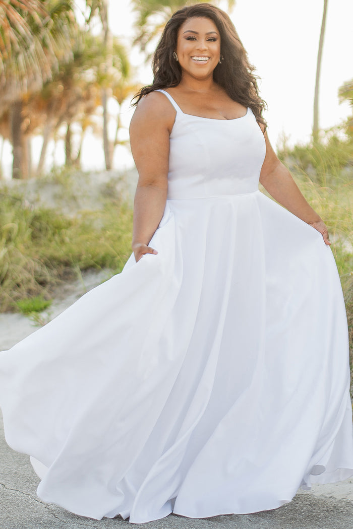 SC5281 Sydney's Bridal by Sydney's Closet Aline silhouette with scoop neckline and 1 inch straps dress features piped waistband and center back zipper available in ivory