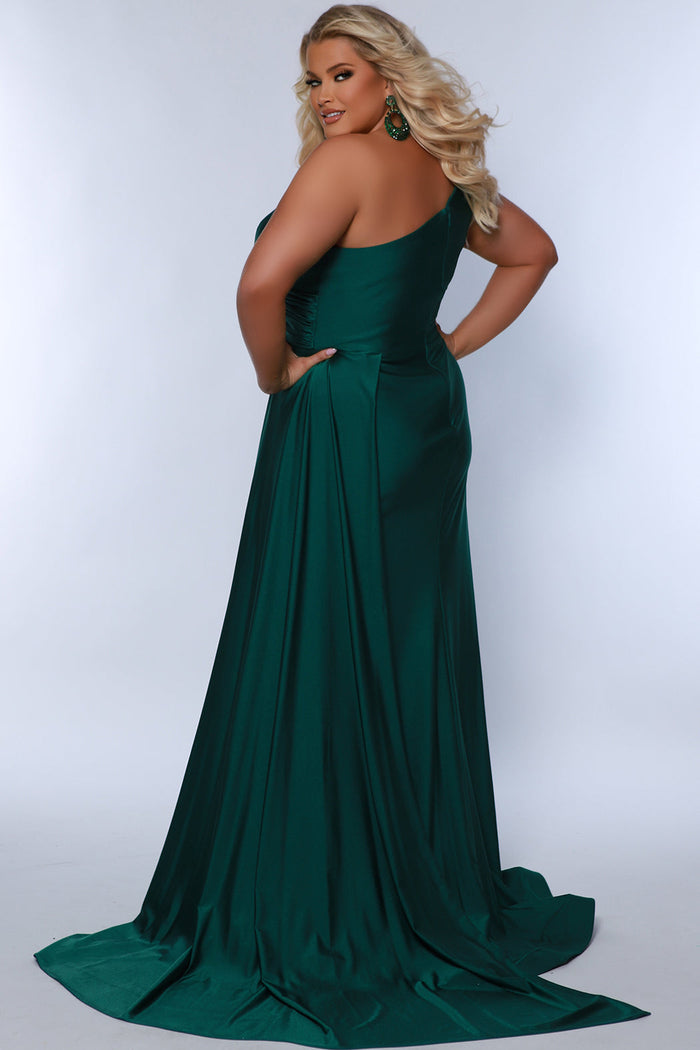 Sydney's Closet SC7377 Green. Stretch jersey over stretch knit lining, One-shoulder neckline, Ruched bodice, Natural waistline, Slim A-line skirt with train, Side fly away panel at waist, Long invisible center back zipper, Horsehair hem, Sweep train