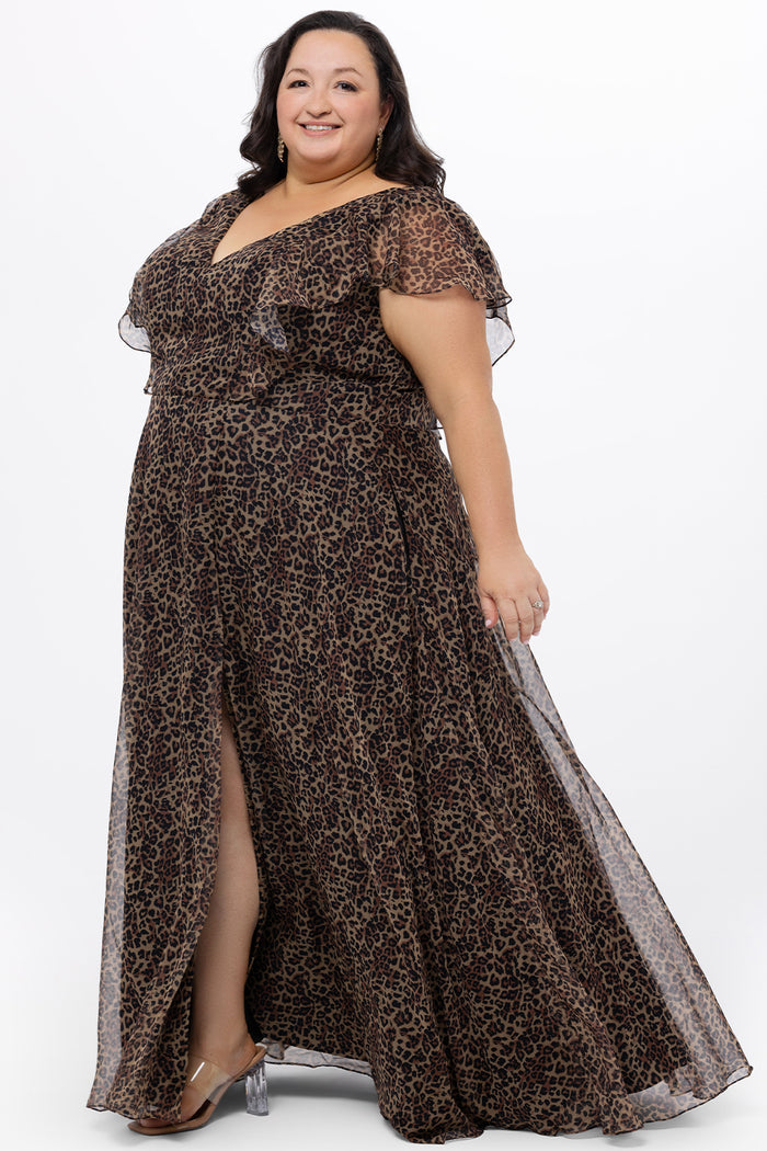 Celebrations by Sydney's Closet style CE2606 in animal print. 

Long plus size animal print dress.  V-neck, short flutter sleeves, natural waistline, pockets and ruffles on bodice princess seams. Left leg slit. Made from printed chiffon and light satin lining. High scoop back and center back zipper.