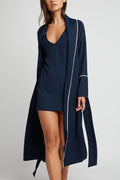 Navy robe with long sleeves, open front, and white piping edge detailing