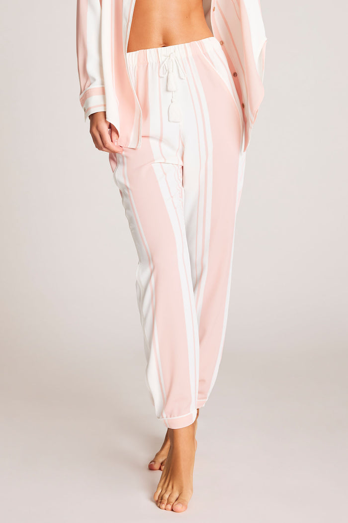 Light pink and white striped jogger pants with elastic cuffs and drawstring waist