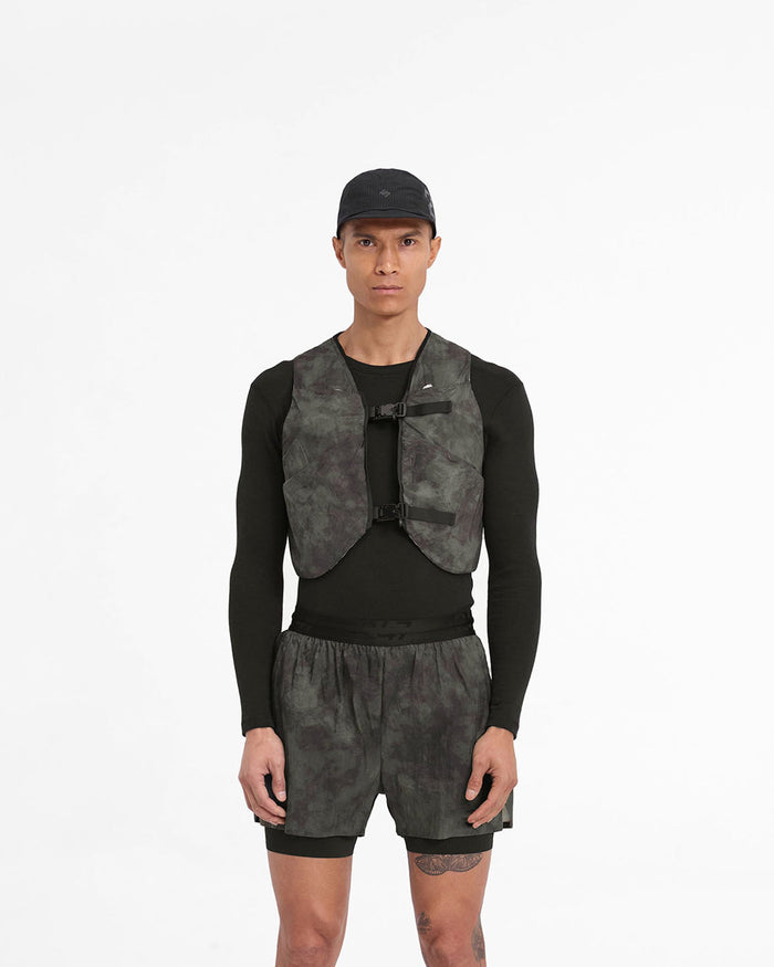 Man wearing a chest rig in terrain on a plain white background | Team 247 Chest Rig in Terrain | Accessories with magnetic buckles and multiple stretch power mesh pockets | 247 Accessories | Represent Clo