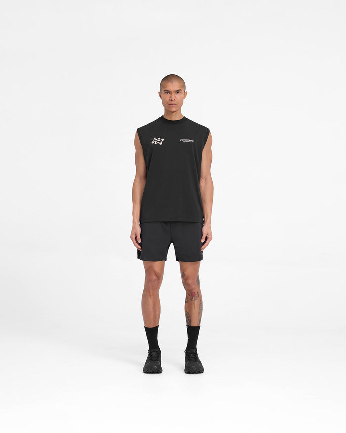 Man wearing black training shorts on a plain white background | Team 247 Fused Shorts in Black | Sustainable shorts with 4-way stretch and branded waistband | 247 Shorts | Represent Clo