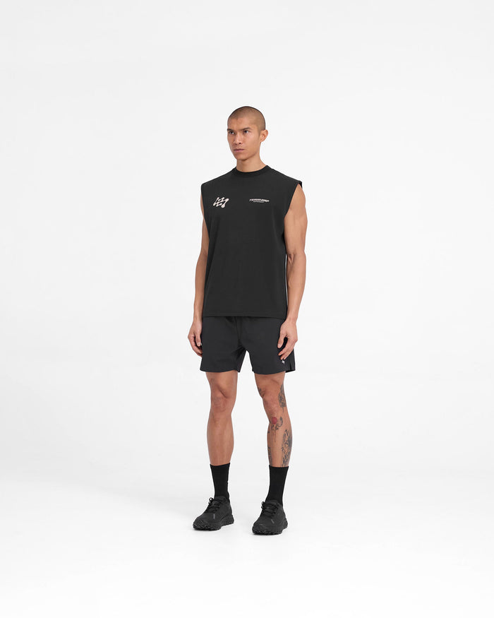 Man wearing black training shorts on a plain white background | Team 247 Fused Shorts in Black | Shorts with branded waistband and reverse coil zippers | 247 Shorts | Represent Clo