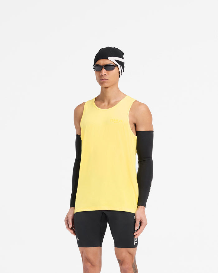 Man wearing a yellow running vest on a plain white background | Team 247 Run Vest in Lemon | Lightweight breathable running vest | 247 T-Shirts | Represent Clo