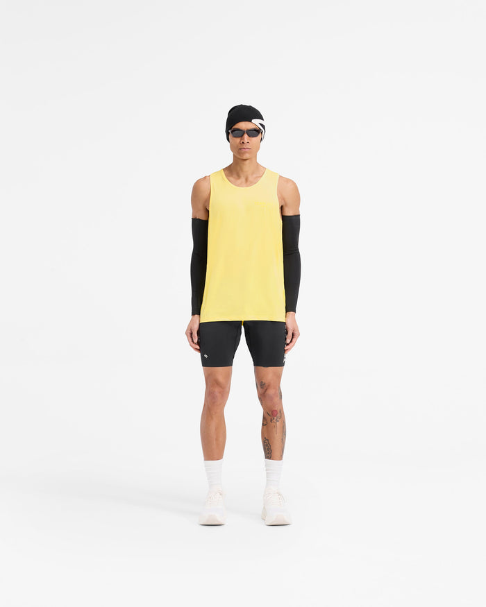 Man wearing a yellow running vest on a plain white background | Team 247 Run Vest in Lemon | Lightweight breathable running vest | 247 T-Shirts | Represent Clo