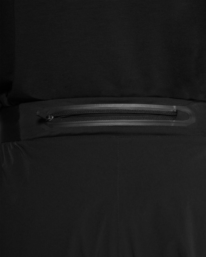 Man wearing black training pants on a plain white background | Team 247 Training Pant in Black | Pants with zip pockets and elasticated waistband | 247 Pants | Represent Clo