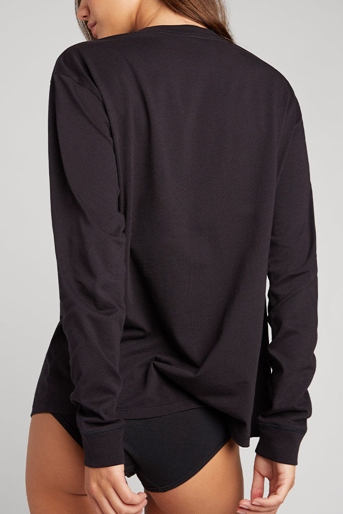 Black crew-neck long-sleeve uniform top, back view