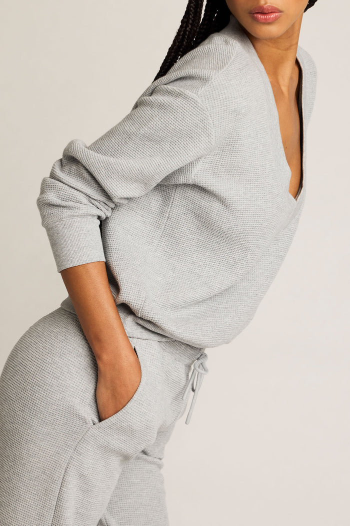 Heather grey waffle-knit pullover with deep V and matching drawstring waist pants