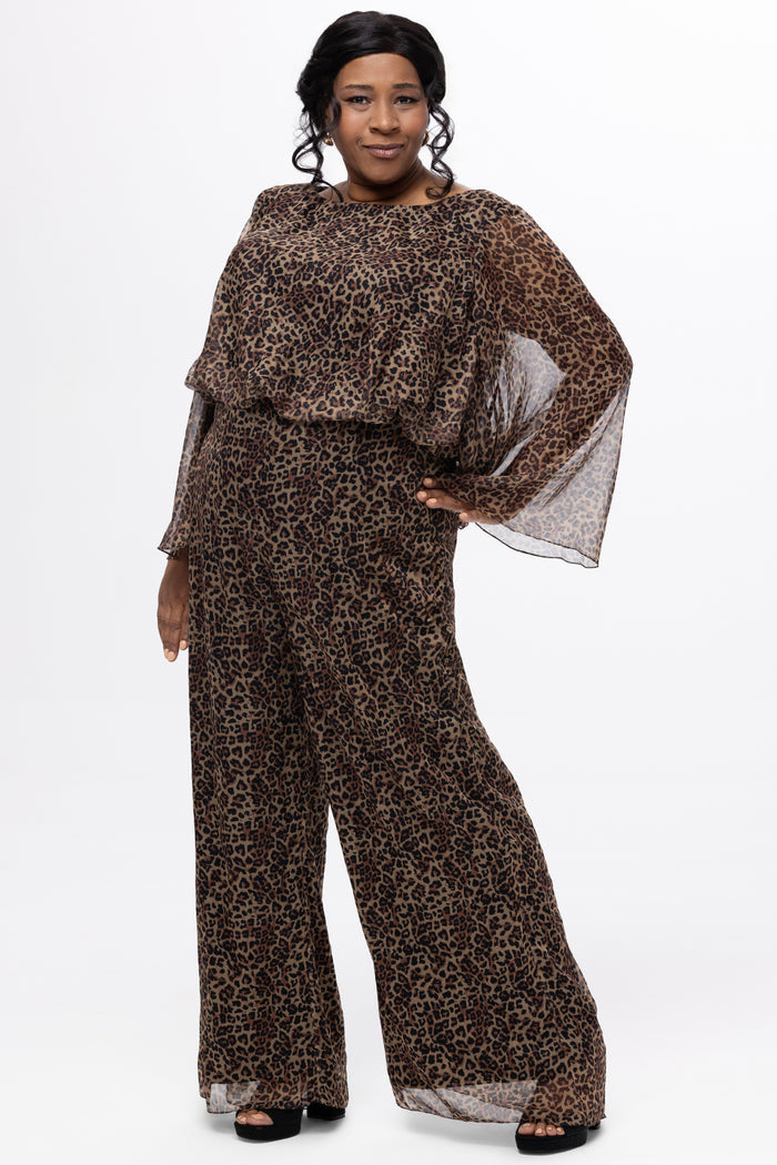 Plus size one-piece animal print jumpsuit. Long flowy chiffon sleeves and blouson bodice, elastic waist, and wide-leg pants. Center back zipper and scoop neckline. CE2607 available in sizes 14-28 in animal print. Celebration's by Sydney's Closet.