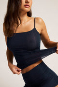 Navy ribbed cami top with crossover waist and ruffled hem