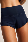 Navy ribbed high-rise mini shorts with elastic waistband and seam detail